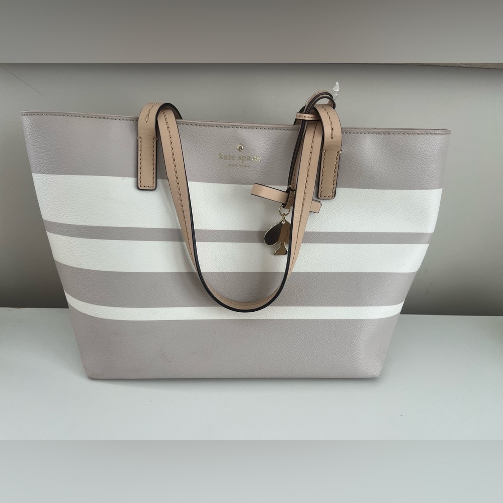 Barely used beige and off white striped kate spade tote